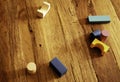 Toys blocks, multicolor wooden building bricks, heap of colorful game pieces on a wood table Royalty Free Stock Photo