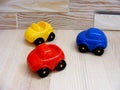 Baby toys blue red yellow cars Royalty Free Stock Photo