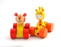 Toys for children. Wooden animal figures on wheels.