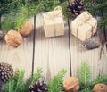 Toys for the Christmas tree and pine cones on old wooden background Royalty Free Stock Photo