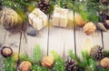 Toys for the Christmas tree and pine cones on old wooden background Royalty Free Stock Photo