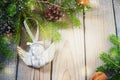 Toys for the Christmas tree and pine cones on old wooden background Royalty Free Stock Photo