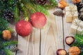 Toys for the Christmas tree and pine cones on old wooden background new Year Royalty Free Stock Photo