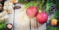 Toys for the Christmas tree and pine cones on old wooden background new Year Royalty Free Stock Photo