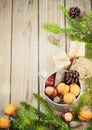 Toys for the Christmas tree and pine cones on old wooden background new Year Royalty Free Stock Photo