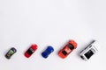 Toys constuctor and cars, top view on white background, place for text Royalty Free Stock Photo