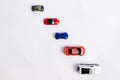 Toys constuctor and cars, top view on white background, place for text Royalty Free Stock Photo