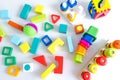 Toys kids background. Wooden cubes with numbers and colorful toy bricks on a white background. frame made of accessories Royalty Free Stock Photo