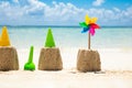 Toys And Pinwheel In Front Of Sea At Beach Royalty Free Stock Photo