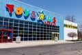 Muncie - Circa April 2018: Toys `R` Us Retail Strip Mall Location. Toys `R` Us is going out of business after filing bankruptcy II Royalty Free Stock Photo