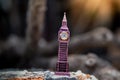 Toys that represent two of the main symbols of the city of London, The London famous Big Ben model on blurred background.