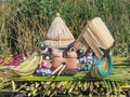 Toys, Souvenirs, and handicrafts made at Uros floating island and village on Lake Titicaca near Puno, Peru Royalty Free Stock Photo