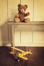 Toys on wooden bench with vintage look Royalty Free Stock Photo