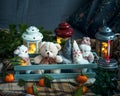 Toys with wooden plank box, lighted lanterns. Warm plaid and tangerines with leaves. In the foreground, the sides are in