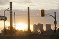 TPP thermal power plant on a sunrise. Refinery with smokestacks. Smoke from factory pollutes the environment. High red and white t