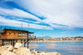 Trabucco al porto, overlooking the Pescara seafront, with the bell tower of the Divino Amore church and the Gran Sasso mountain Royalty Free Stock Photo