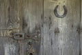 barn door, deadbolt and horseshoe Royalty Free Stock Photo