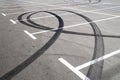 Trace of motorcycle tire on the asphalt in a parking Royalty Free Stock Photo