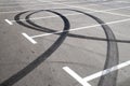 Trace of motorcycle tire on the asphalt in a parking Royalty Free Stock Photo