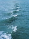 Trace tails of speed boat on water surface in the sea