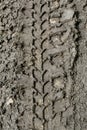 Trace of tires on a dirt road closeup Royalty Free Stock Photo