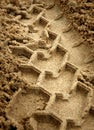 Trace of tyre in the sand Royalty Free Stock Photo