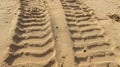 Trace of wheels on the sand Royalty Free Stock Photo