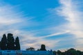 Traces of airplanes spread across the sky, stretching over huge distances, concept about the impact of the climate