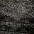 Traces of car tires on asphalt. Texture of asphalt surface. Grun Royalty Free Stock Photo