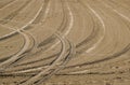 Traces of car tires in the sand in Rosas Royalty Free Stock Photo