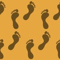 Traces of human feet, footprint in the sand seamless pattern, background for design