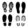 Traces of human shoes sole silhouette black. Icon or sign for printing. Flat style. Isolated on a white background. Vector