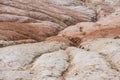 Traces in the slopes of multi-colored limestone hills from rivers and streams