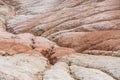 Traces in the slopes of multi-colored limestone hills from rivers and streams