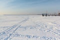 Traces snow on the frozen river Royalty Free Stock Photo