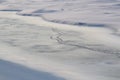 traces on the snow surface in winter Royalty Free Stock Photo