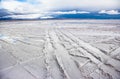 Traces of tires, tourist vehicles on salt lake, Salar de Uyuni in Bolivia