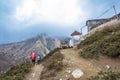 Two tourists on a mountain trail on April 5, 2018 on a track around Annapurna, Nepal.