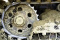 The track and gear wheel of bulldozer on the sand