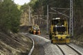 Track-laying machines during track renewal