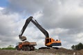 Loading a dumper truck