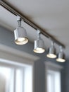 Track lights installed on a ceiling in a modern interior. Royalty Free Stock Photo