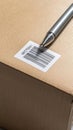 Track package with pen and barcode for Delivery and Logistics Royalty Free Stock Photo