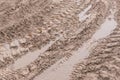 Track pattern trail from vehicle on dirty sandy road soil from wheel texture background Royalty Free Stock Photo