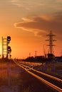 Track and Power Lines at Sunset Royalty Free Stock Photo