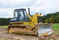 Track-type bulldozer, earth-moving equipment.