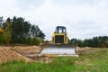 Track-type bulldozer, earth-moving equipment.