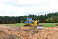 Track-type bulldozer, earth-moving equipment.