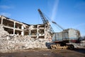 Track-type excavator during earthmoving at construction site. Backhoe digg ground at construction site