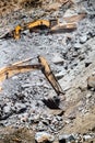 Track-type excavator during rock moving works at open-pit mining Royalty Free Stock Photo